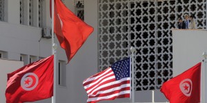 Tunisian and a United States flags flying at the Tunisian Foreign Ministry, for the visit of the US Secretary of State Hillary Clinton, n Tunis, Tunisia, Thursday , March 17, 2011. (AP Photo/Lefteris Pitarakis)